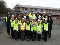 Image of pupils and people outside Welshpool Church in Wales Primary School Image of pupils and people outside Welshpool Church in Wales Primary School
