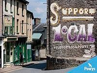 Image of support local slogan on wall