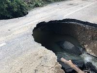 Image of flood damage to road