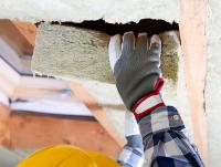 Image of loft insulation being fitted Image of loft insulation being fitted