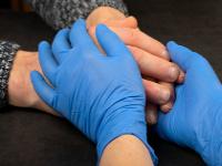 Image of social carer with gloves