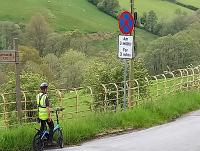 Image of man on an e-bike on a country lane