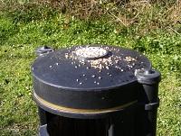 Image showing bird food placed on a litter bin