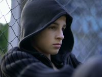 Image of teenage boy in hoodie