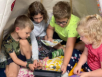Four Children on a Tablet