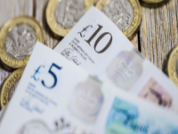 Image of pound coins, and a five pound and ten pound note