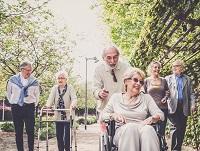Image of a group of older people out for a walk