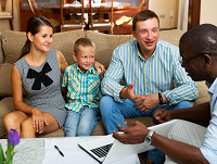 Image of a meeting between a support worker and a family
