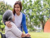 An unpaid carer supporting her mother