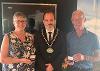 Cllr Gareth Ratcliffe presenting the Silver Kite Awards to Karen and Danny Sherwood