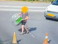 Image from CCTV footage of man dumping rubbish
