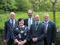 Image of Cllr Jonathan Wilkinson, Vice-Chair; Cllr Beverley Baynham, the new Chair of Powys County Council; Cllr James Gibson-Watt, Leader of Powys County Council; Cllr Gareth Ratcliffe, outgoing Chair; and Cllr William Powell, Assistant Vice-Chair