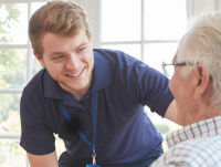 Care worker talking to patient