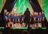 A group of schoolchildren competing on stage at the Urdd Eisteddfod