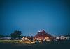 Marquees on the Urdd Eisteddfod Maes at night