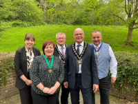 Image of Emma Palmer, Chief Executive; Cllr Beverley Baynham, outgoing Chair; Cllr William Powell, Vice Chair; Cllr Jonathan Wilkinson, the new Chair of Powys County Council; and Cllr Geoff Morgan, Assistant Vice Chair.