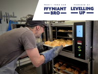 Andy, of Andy’s Bread, using the oven to bake some pain aux noix and pasties