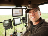 A farmer using agri-tech