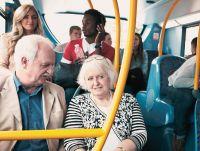 A group of passengers travelling on a bus