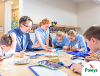 Image of a group of children working together on a science project