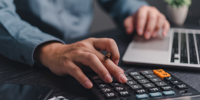 Someone using a calculator