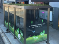 Image of one of the green roof bus shelters that has been installed in the county