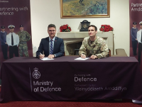Image of Cllr Matthew Dorrance signing the Armed Forces Covenant in 2023