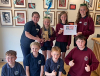 Image of pupils from Ysgol Pennant celebrate winning the Years 5 and 6 Welsh medium category of the Gornest Lyfrau competition