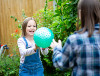 A child playing outdoor with foster carer
