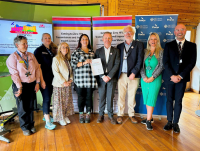 The signing of the Paris Declaration at the Royal Welsh Show with Jeremy Miles MS, Cabinet Secretary for Health and Social Care (centre).