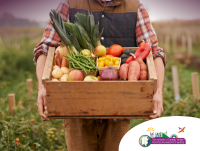 Image of a farmer holding a basket of farm produce