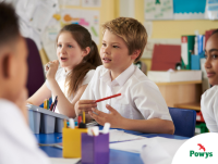 Image of primary school children at a desk