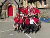 Image of pupils from Montgomery C.i.W celebrating their positive Estyn inspection report