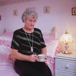 Image of a lady wearing a careline pendant Image of a lady wearing a carleine pendant
