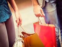 Image of people carrying shopping bags Image of people carrying shopping bags