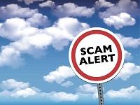 Image of an English scam warning logo