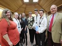 Image of a group of pupils with an award